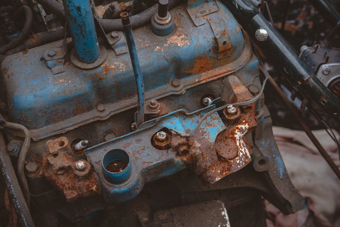 synthetic engine oil pouring car engine close up