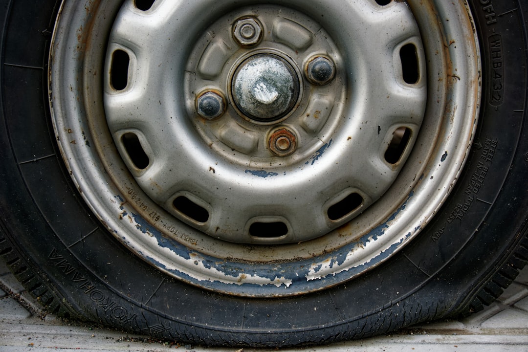 car tire tread wear inspection close-up