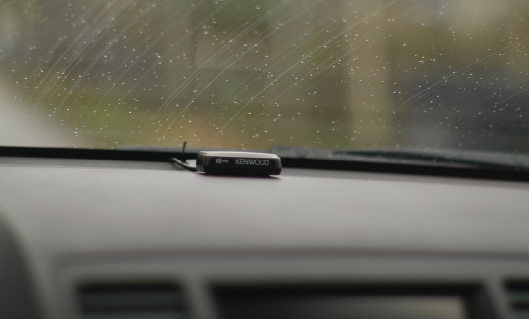 car wiper blade replacement rainy windshield close-up