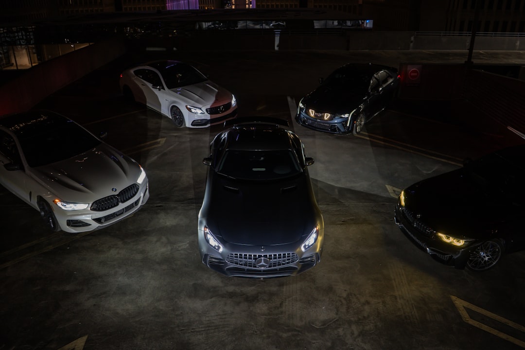 2026 BMW 5 Series Mercedes E-Class comparison luxury sedan driving road