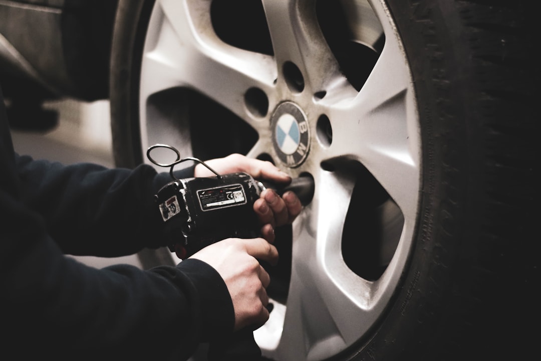 car tire maintenance pressure check close-up 2026