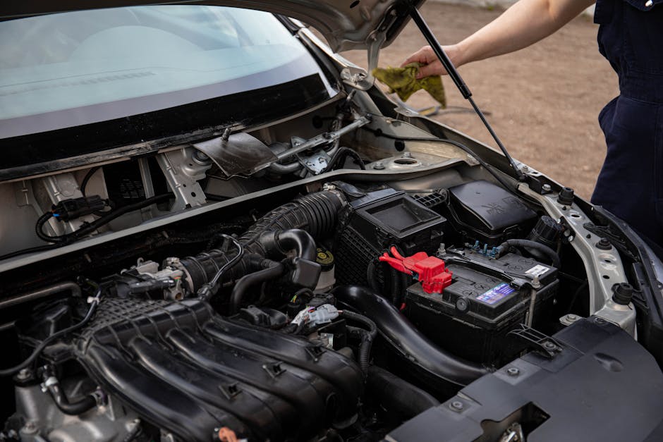 car battery replacement mechanic garage 2026