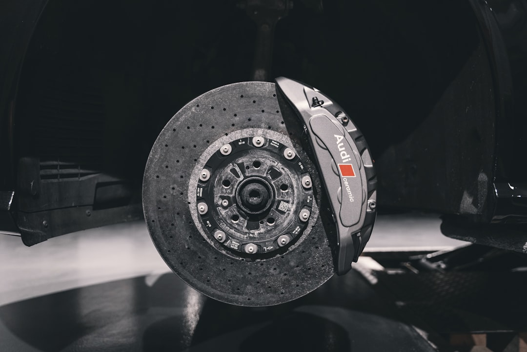 brake pad wear indicator close-up, disc rotor groove inspection