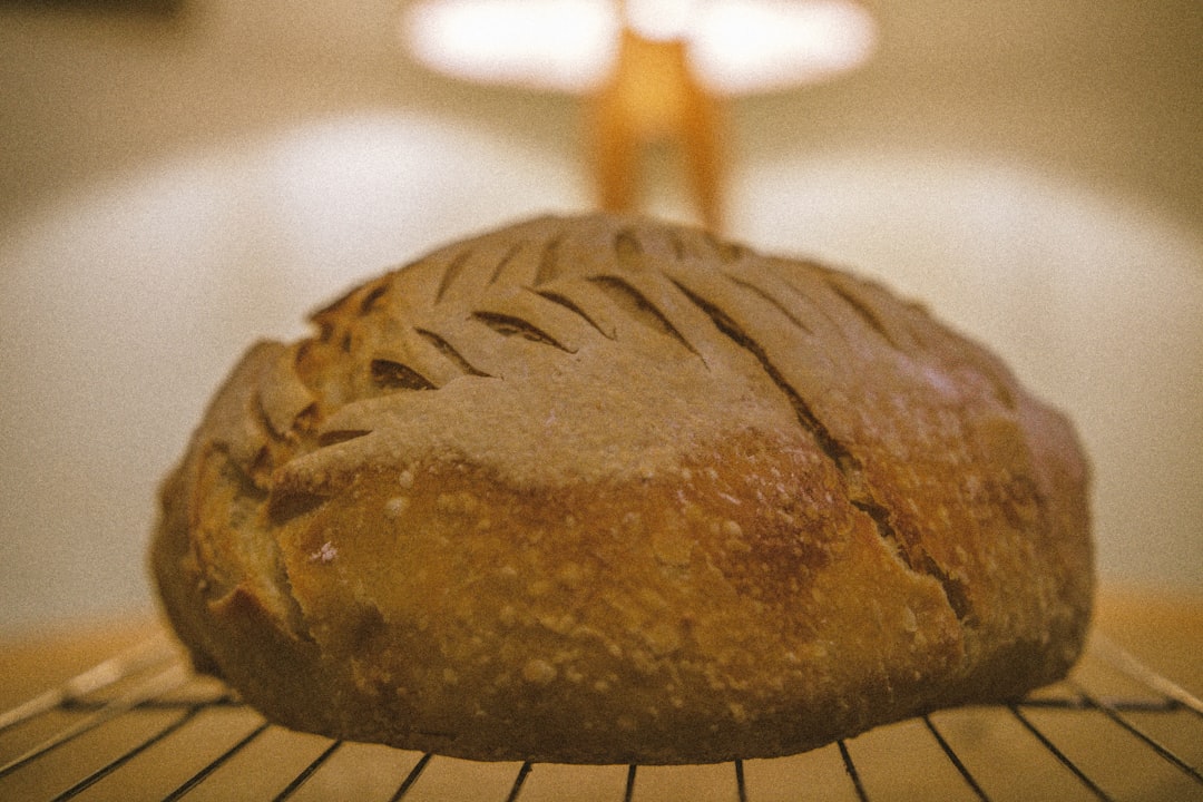 sourdough bread loaf scoring pattern rustic kitchen, flour water starter feeding ratio measurement