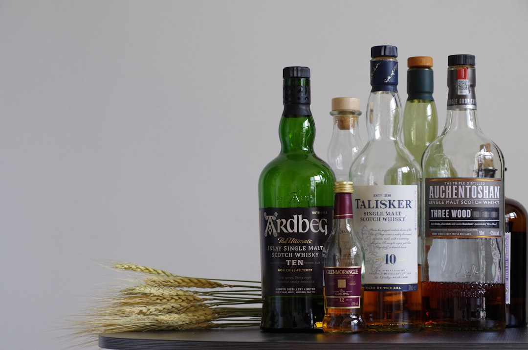 whisky price comparison chart, scotch whisky store shelf 2026
