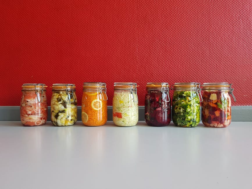 fermented foods jars lineup, kimchi sauerkraut kombucha miso home kitchen